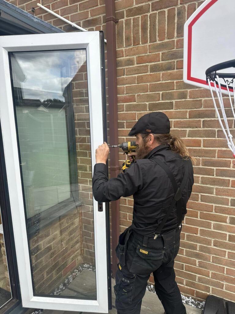 complete lock smiths fitting new backdoor lock